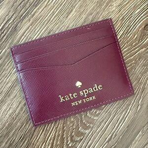 kate spade New York Burgundy Leather Card Case with Gold Logo
